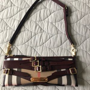 Burberry shoulder bag with cherry red buckles